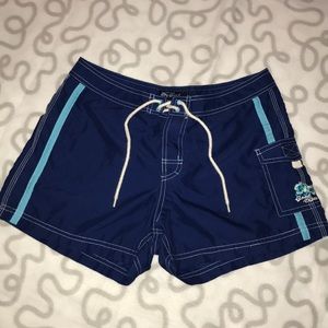 Blue shorts with cute designs on sides.